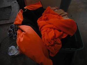 lot 142 image: 2 hunting orange coats