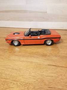 lot 13 image: Dodge Challenger, Ford Starliner