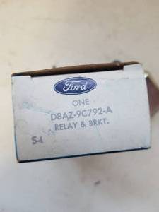 lot 78 image: NOS Ford Vacuum Canister, Cruise Control Relays
