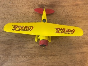 lot 129 image: Coca-Cola Airplane Diecast Bank