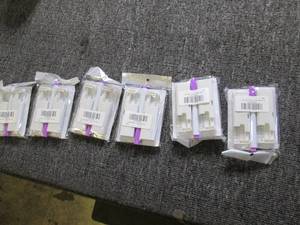 62 packs of ear piercing guns ...