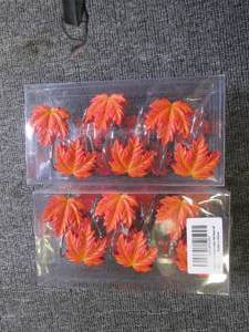 2 sets of maple leaf decorations ...