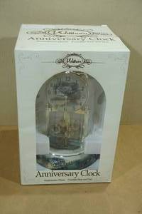 lot 203 image: Waltham Anniversary Clock with Porcelain Base and Dial