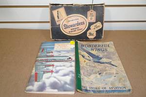 lot 253 image: Vintage Stewardess Steam Iron with 2 Aviation Books