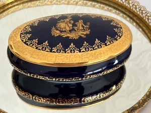 lot 24 image: Limoges Lidded Trinket Box and Round Vanity Mirror