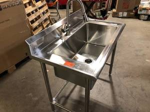 lot 25 image: 41.7 in. x 24 in. x 49.2 in. Stainless Steel Utility Sink with Pull out Faucet by TRINITY Customer Returns See Pictures