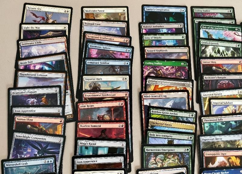 lot 16 image: Lot of 120 MTG 2022 Neon Dynanity Cards-100 Common 20 Uncommon