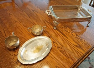 9 x 13 glass baker with silver stand, silver plate, silver play, Italy cream, sugar, and serving tray.