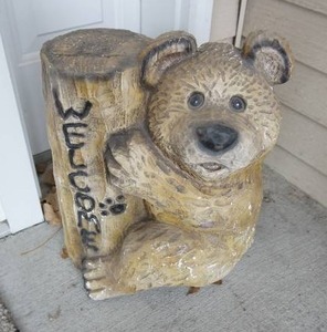Carved resin welcome bear