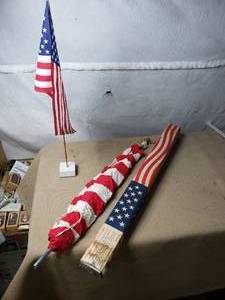 Small American Flag on Stand, Larger Flag on Pole