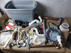 lot 103 image: Tote Full of Plumbing Items