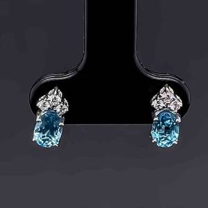 Oval Cut Blue Topaz & Diamond Cluster Stud Earrings in 14k Yellow Gold
