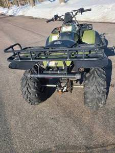lot 1A image: Polaris sportsman 400 4 wheeler with plow
