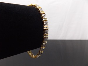 lot 54 image: .925 Sterling Silver Diamond Accented Vermeil Tennis Bracelet