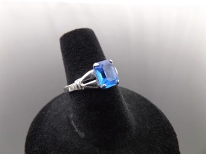 lot 58 image: .925 Sterling Silver Emerald Cut Sapphire Crystal Ring Size 6.5