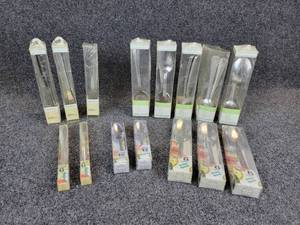 lot 1211 image: Large Lot of Flatware - Teaspoons, Serving Spoons, and Butter Knives