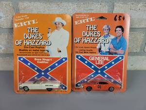 lot 1013 image: Original 1981 ERTL The Dukes of Hazzard 164 Scale Cars - Boss Hoggs Cadillac and General Lee - Both in Original Blister Packs