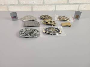 lot 1021 image: (8) Belt Buckles and (2) ZIPPO Lighters