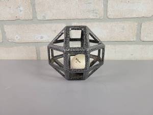 lot 1026 image: Dotson Iron Casting Co. Mankato, MN, Golf Ball Inside Cast Iron Octagon