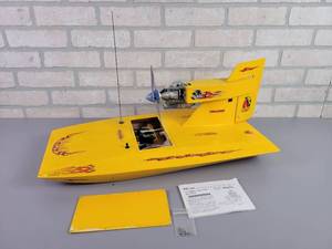 lot 1037 image: Vintage DUMAS Windy Air Boat RC Boat w O.S. LA10 Engine