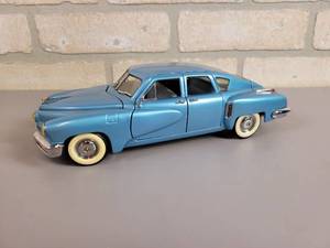 lot 1054 image: Franklin Mint 1948 TUCKER Diecast Model - 124 Scale w paperwork and Box