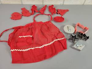 lot 1071 image: Vintage Tupperware Cookie Cutters, Vintage Childs Apron and Metal Cookie Cutters