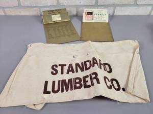 lot 1073 image: 1940s Massey & Berg Feed Madelia, MN Metal Clipboard  Calendar, Chas A. Bennet Co. Metal Clipboard and Standard Lumber Pouch
