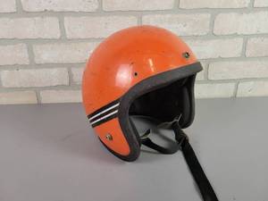 lot 1107 image: Vintage NORCON Orange Motorcycle Helmet