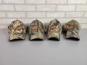 lot 1197 image: (4) NEW Realtree Miller Lite Wildlife Series Caps