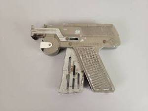 lot 1225 image: Vintage LMCO Super Numatic Cap Gun
