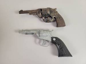 lot 1227 image: (2) Vintage Cap Guns - Diecast and Stamped Steel