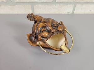 lot 1273 image: 1960 Treasure Craft Ceramic Head Ashtray w Rest - Compton, CA