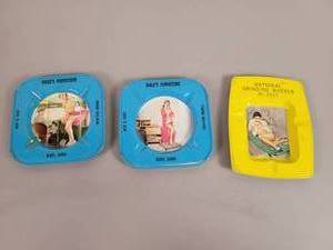 lot 1319 image: (3) Vintage Steel Pinup Girl Ashtrays
