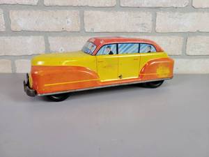 lot 1333 image: 1950s Tin Litho WOLVERINE Toy Taxi Cab