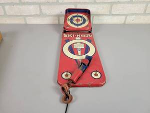 lot 1342 image: Vintage Tin Ski-Hoop Game - Automatic Toy Company