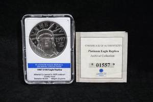 lot 32 image: American Mint Platinum Eagle Replica Coin