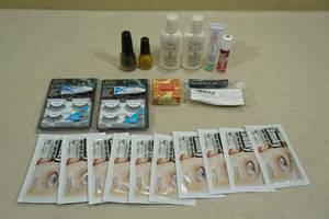 lot 192 image: Assorted Selfcare Products -Nail Polish, Nail Clippers, Lotion, Eye Lashes, Eye Patches