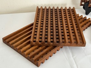 lot 52 image: Four Vintage Wooden Trivets