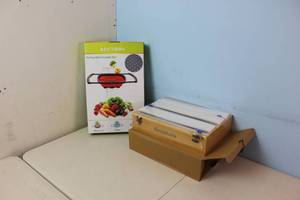 lot 70 image: Colander and Wooden Wrap HolderCutter Combo