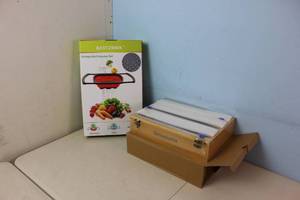 lot 71 image: Colander and Wooden Wrap HolderCutter Combo