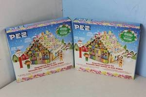 lot 102 image: 2 Units of Pez Holiday Dispenser Gingerbread House Kit