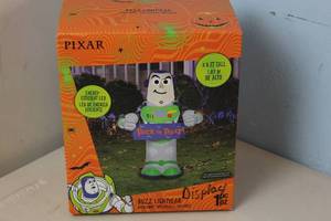 lot 110 image: Gemmy Airblown Stylized Buzz with Banner Disney 3.5 ft Tall Multicolored