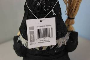 lot 143 image: Ceramic Halloween Gnome  - Chipped on bottom see picture