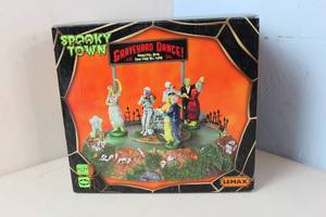 lot 150 image: Lemax Spooky Town Graveyard Dance # 34601 - Open Box