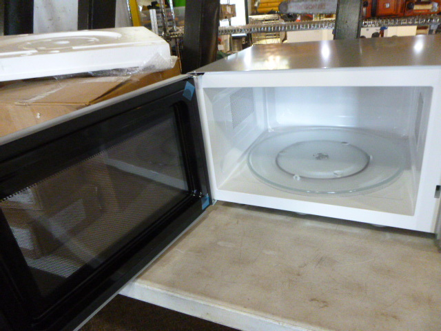 Sold at Auction: Sunbeam Small Counter Microwave