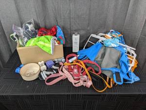 A Variety of Dog Items Including Leashes, Toys, Clothes and More