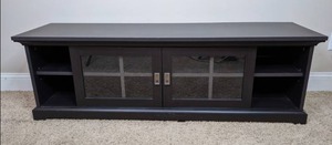 Sleek Black Sliding Door TV Console