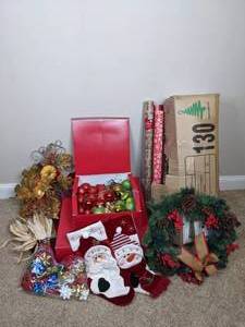 An Assortment of Christmas Items Including a 7 Foot Tree, Christmas Lights and More