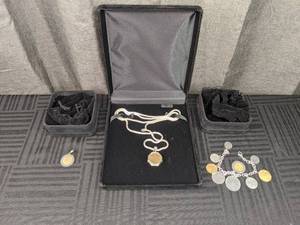 Italian Coin Jewelry Including a Bracelet and Sterling Framed Pendant
