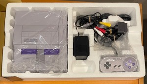 lot 76 image: Super Nintendo Gaming System